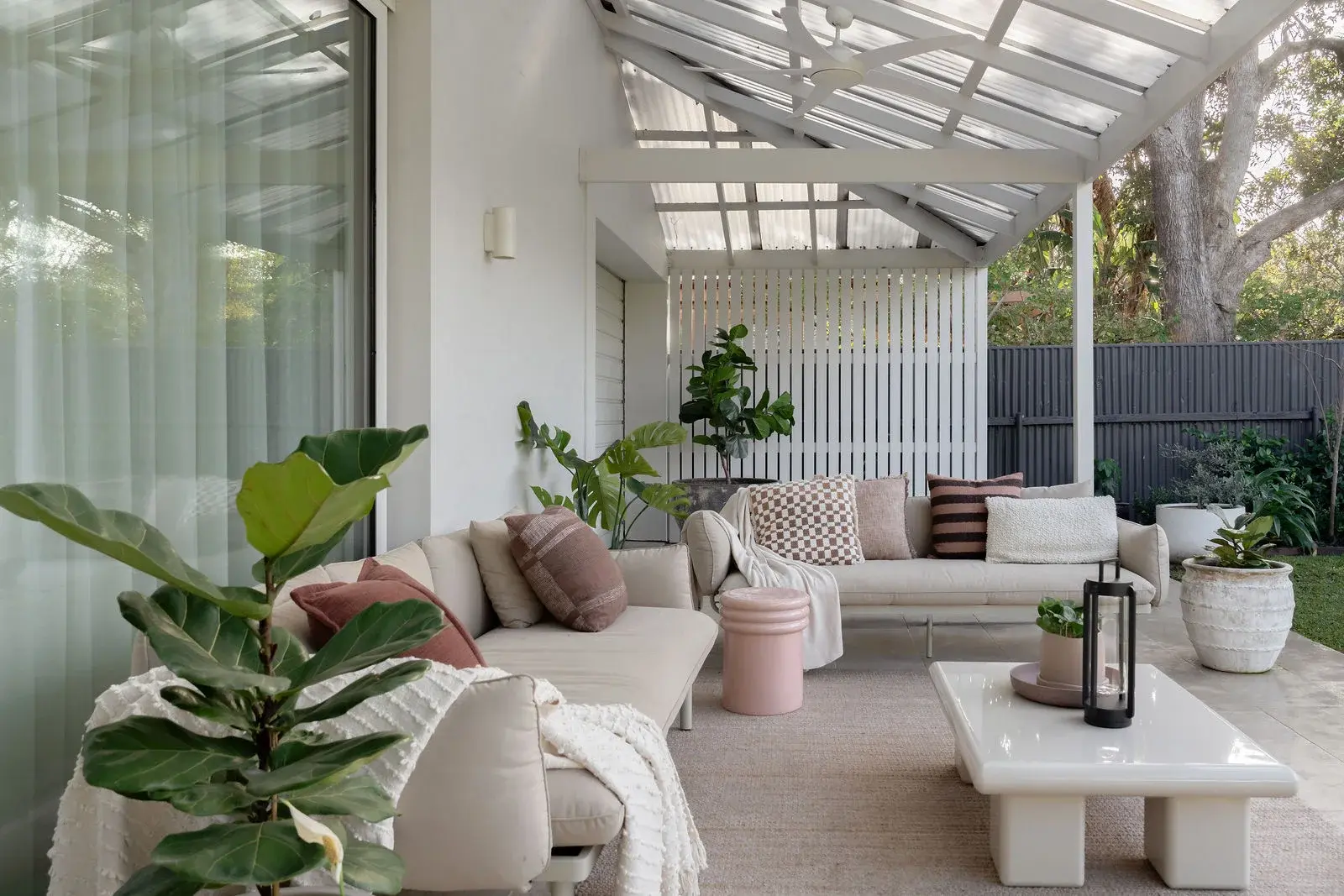Covered entertainer's terrace with lounge setting
